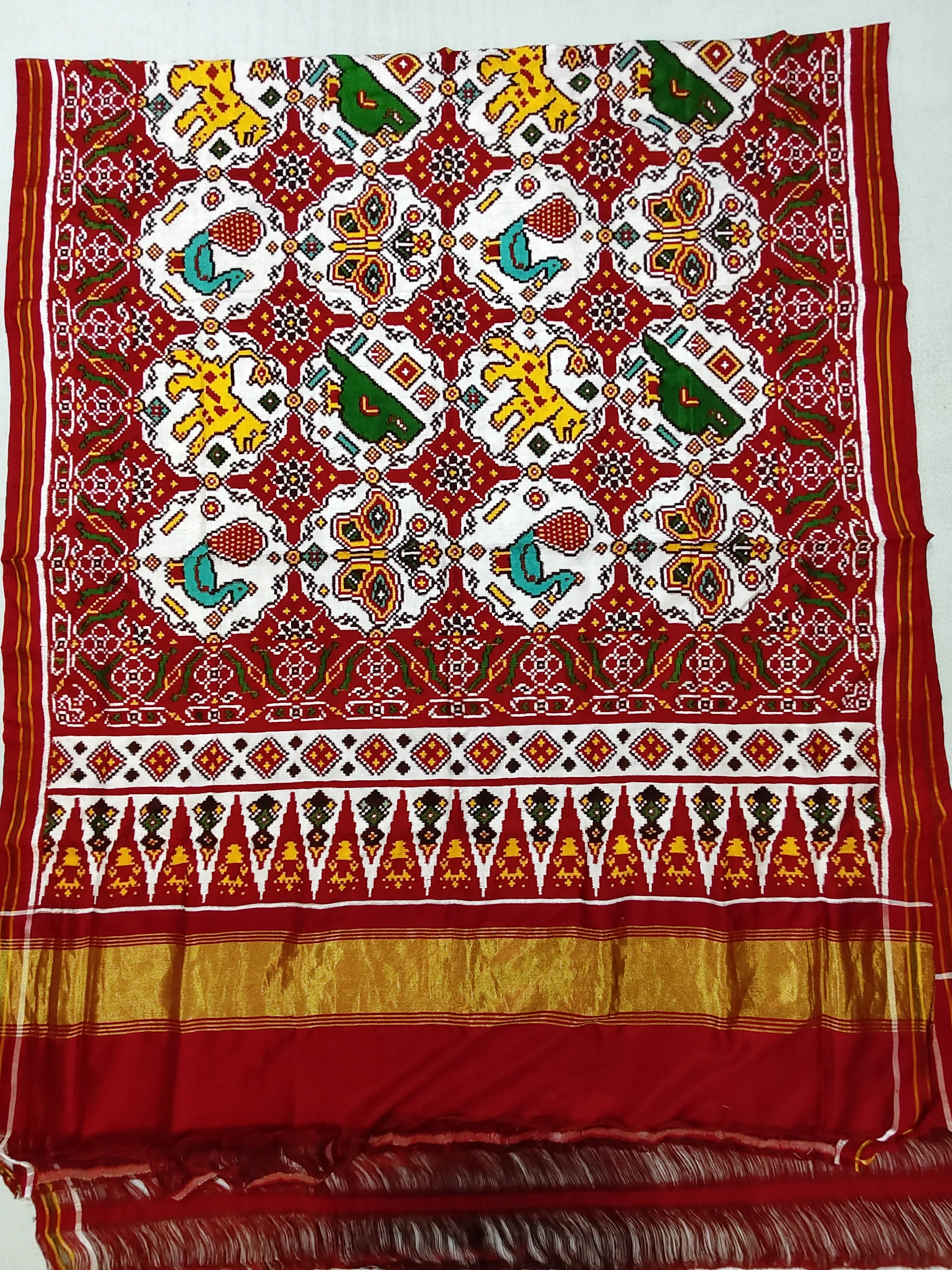 Double Ikat Patola Saree – Red & White | Triful Border | Big Animal Motifs