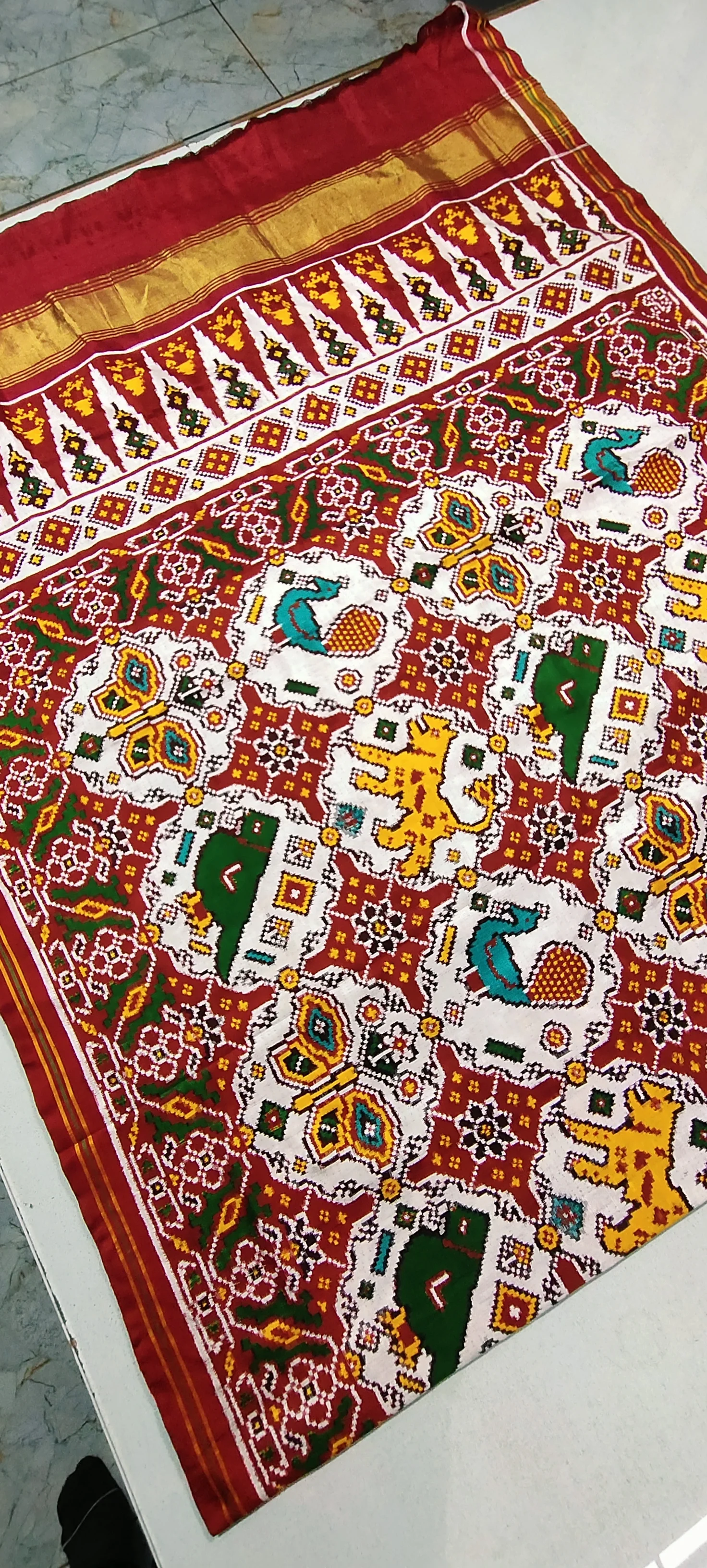 Double Ikat Patola Saree – Red & White | Triful Border | Big Animal Motifs