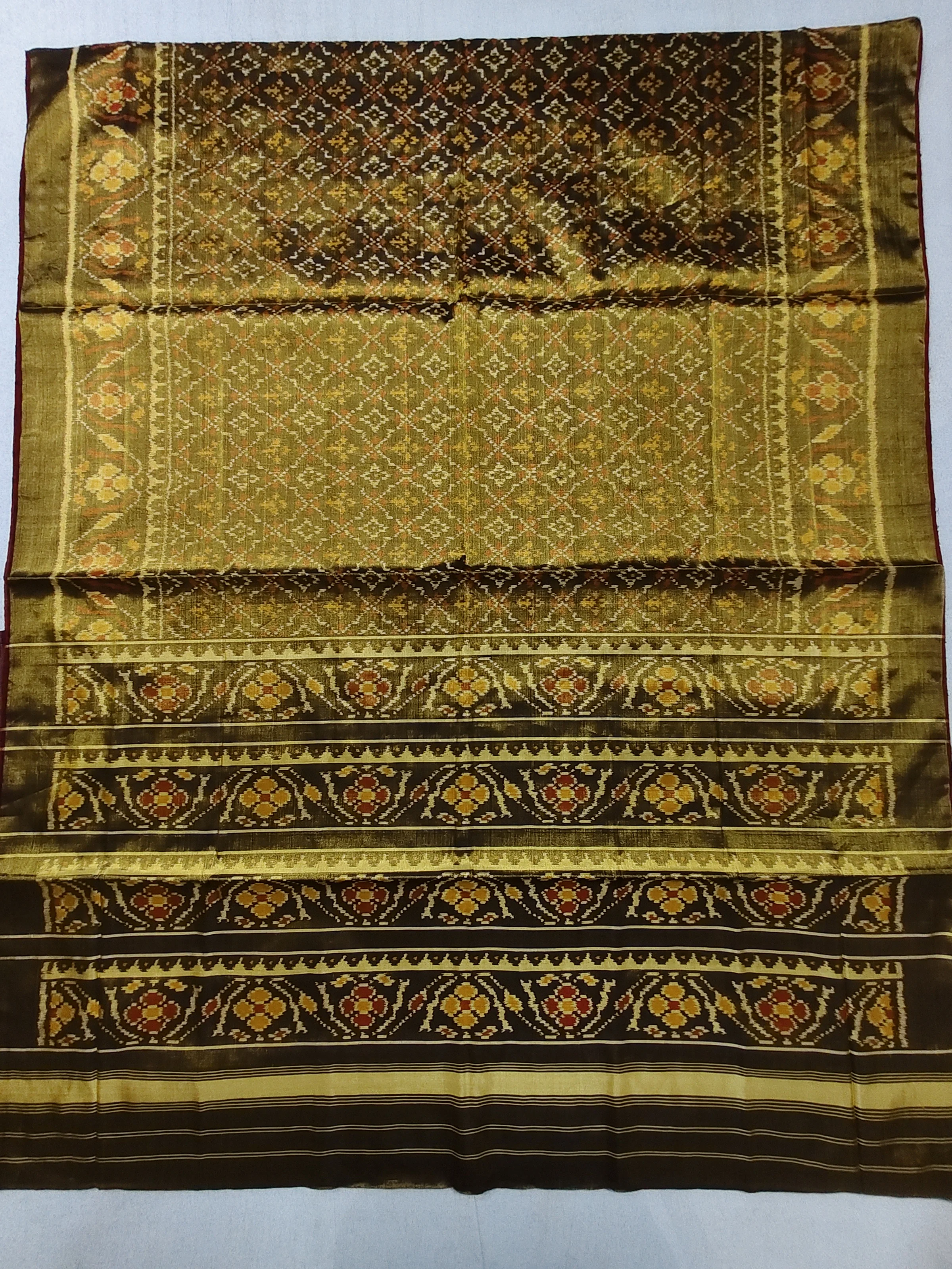 Tissue Patola Saree with Triful Border and Buttonful Motifs