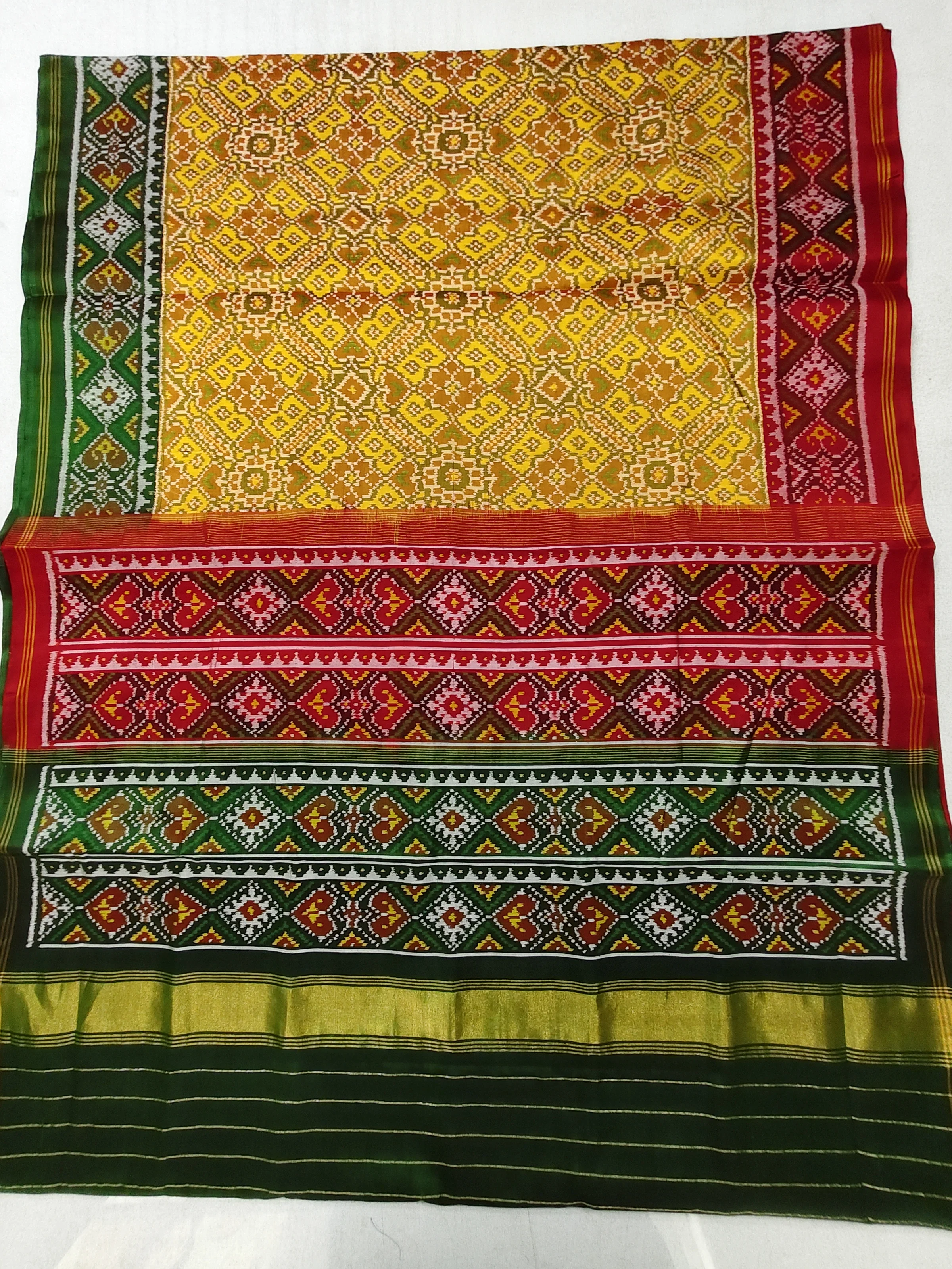 Ganga Jamna Selari Border Manekchowk Yellow Motifs Single Ikat Patola Saree with Green Plain Blouse Piece (8 Ply Silk)