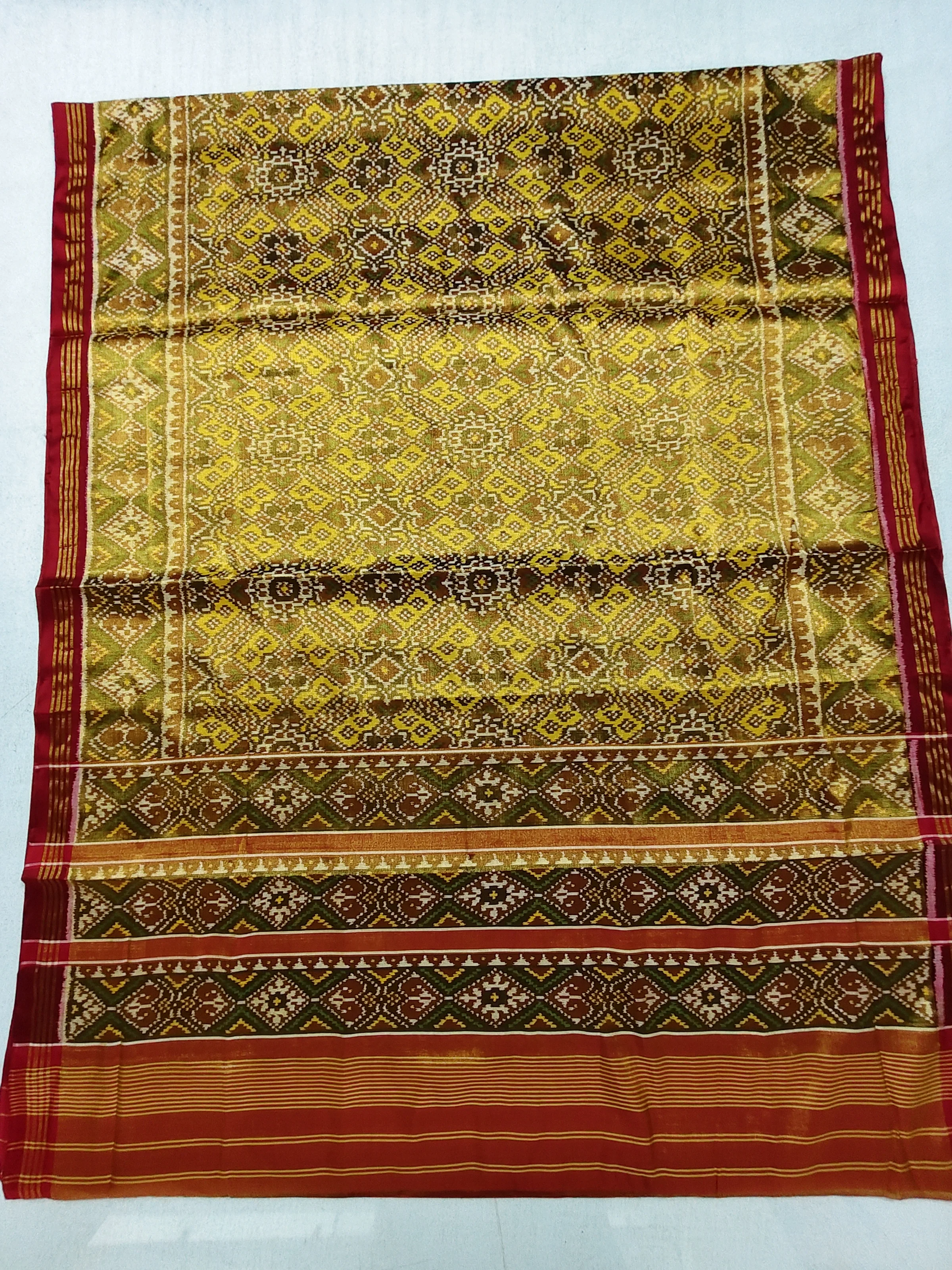 Yellow Tissue Patola Saree with Selari Border & Manekchowk Motifs