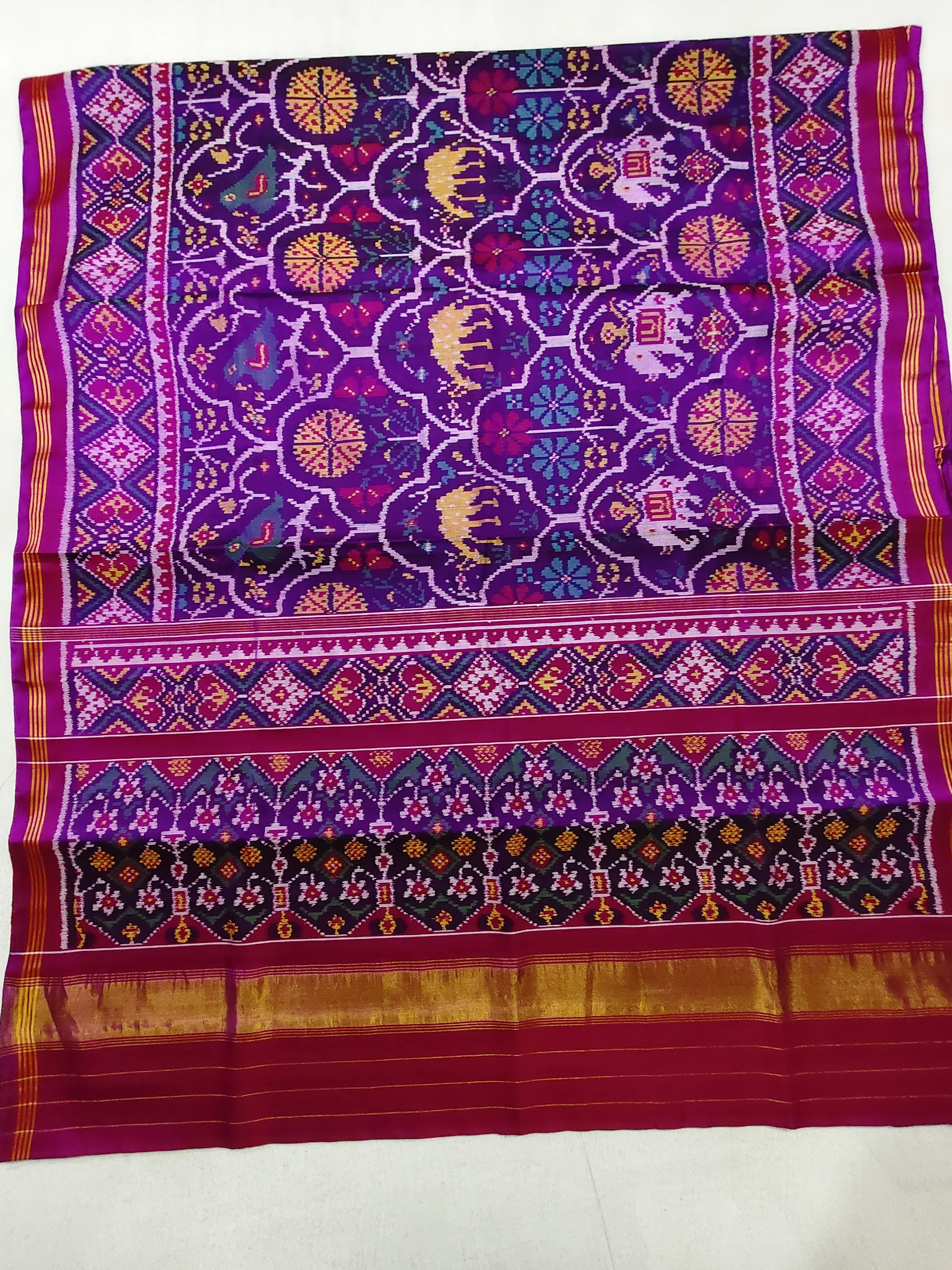 Magenta Selari Border Multi Colour Animal Motifs Single Ikat Patola Saree 8 Ply Silk